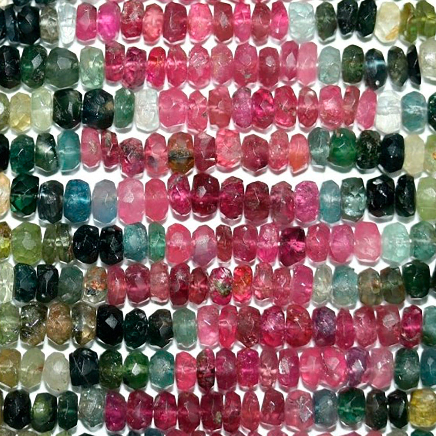 13" St Tourmaline Faceted Rondelle 4x3mm.-Strand 33cm