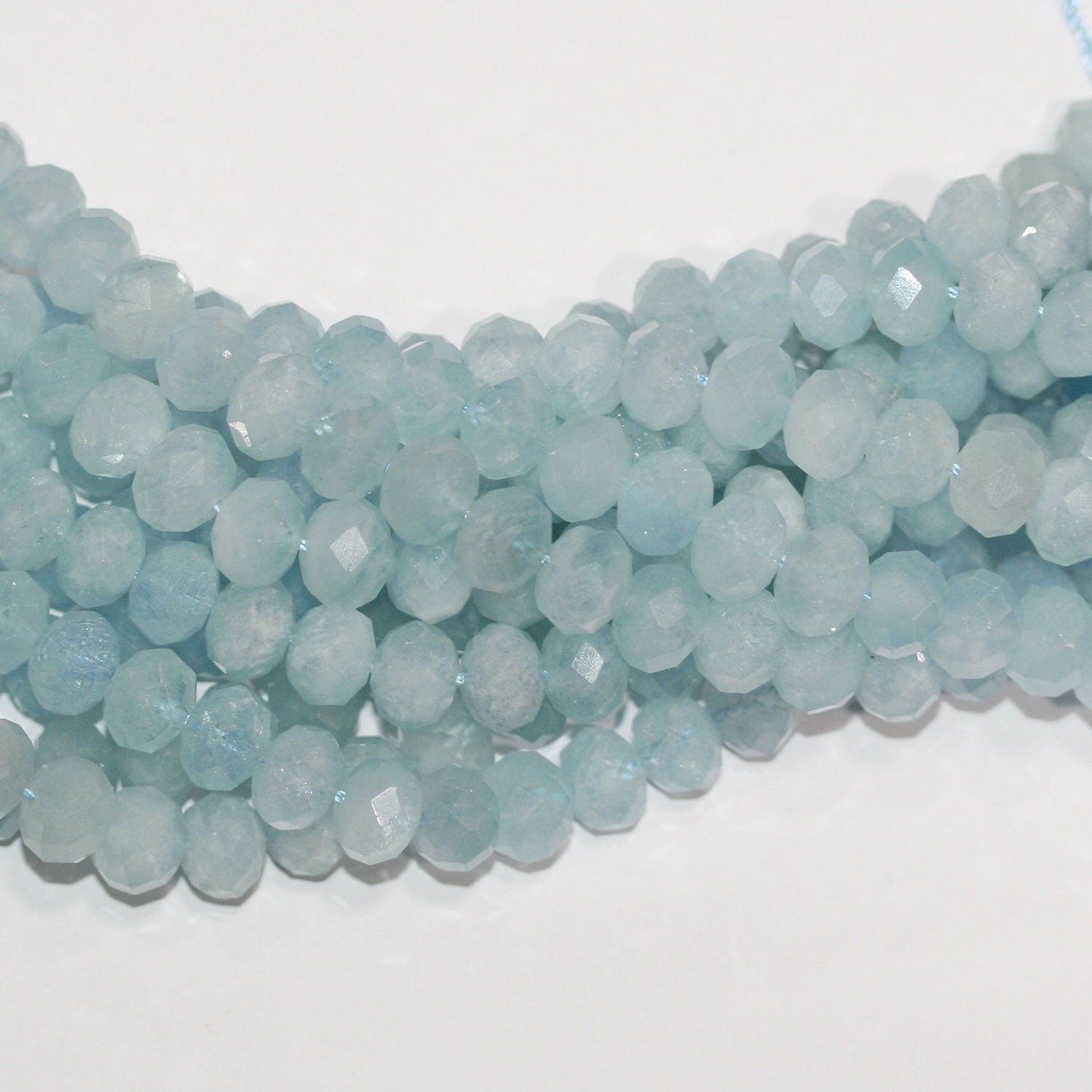 Perles rondelles à facettes en aigue-marine de 15 pouces, 10 x 7 mm. - Fil de 39 cm.
