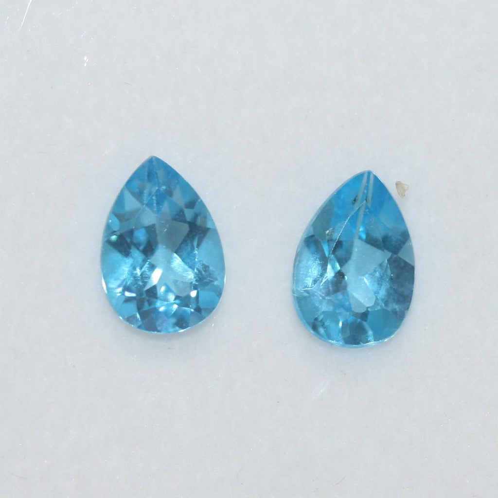 Lote de 2 piezas de topacio azul suizo facetado, 8 x 6 mm. (2 piezas)