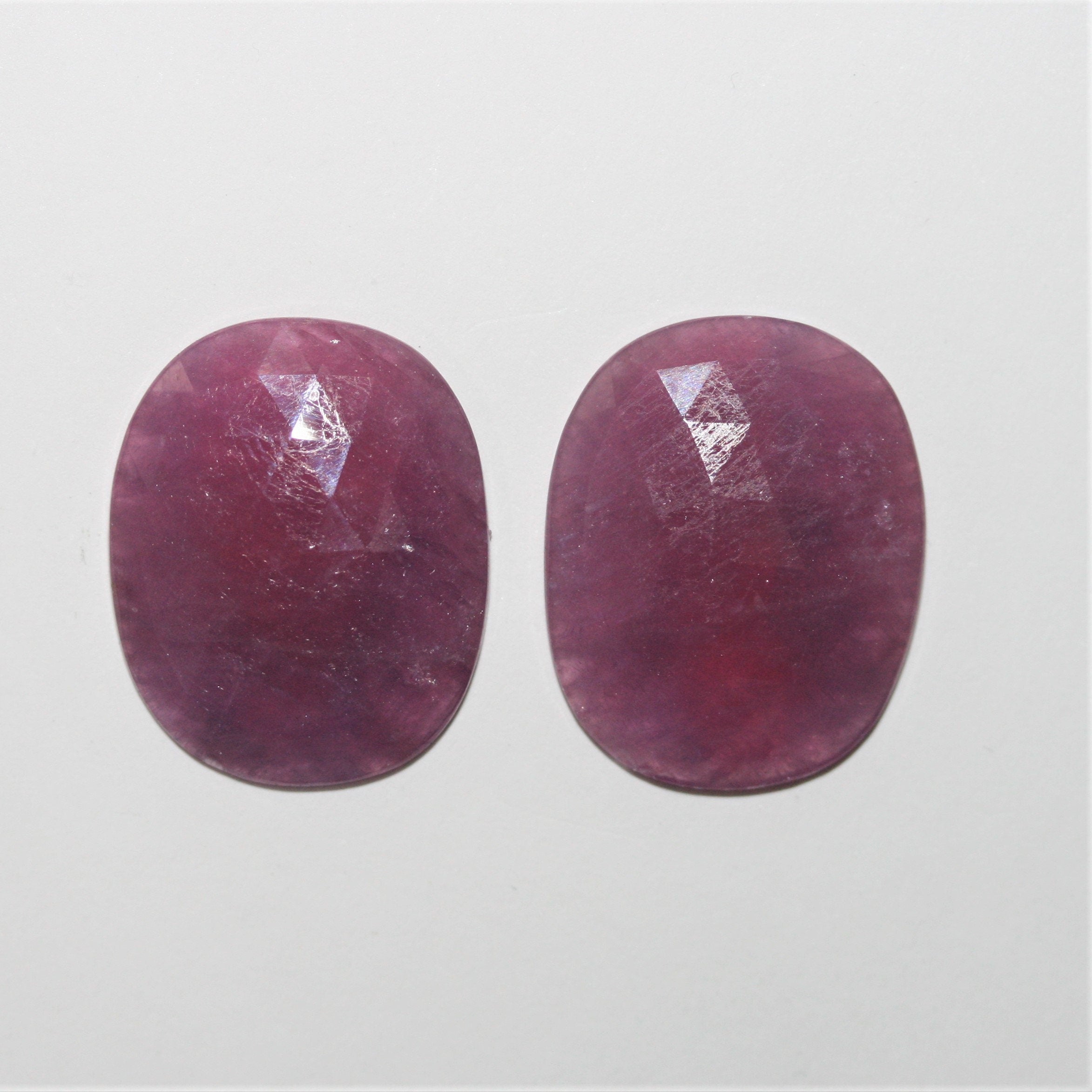 Ruby Faceted Oval Cabochon 23.5x19mm. (34 ct).- 1 Pair