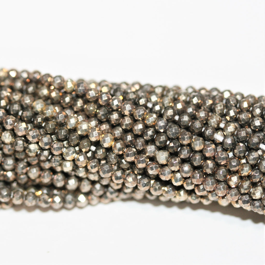 13" St Silver Pyrite Faceted Round 2mm.-Strand 33cm.