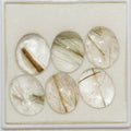 Lote de 6 cabujones ovalados de cuarzo rutilado de 12 x 10 mm. (6 uds.)