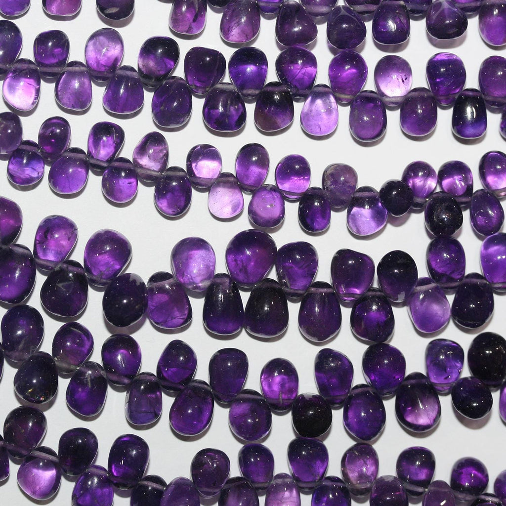 Cuentas lisas de amatista de 8" (7 x 5 mm). Hilo de 20 cm aprox.