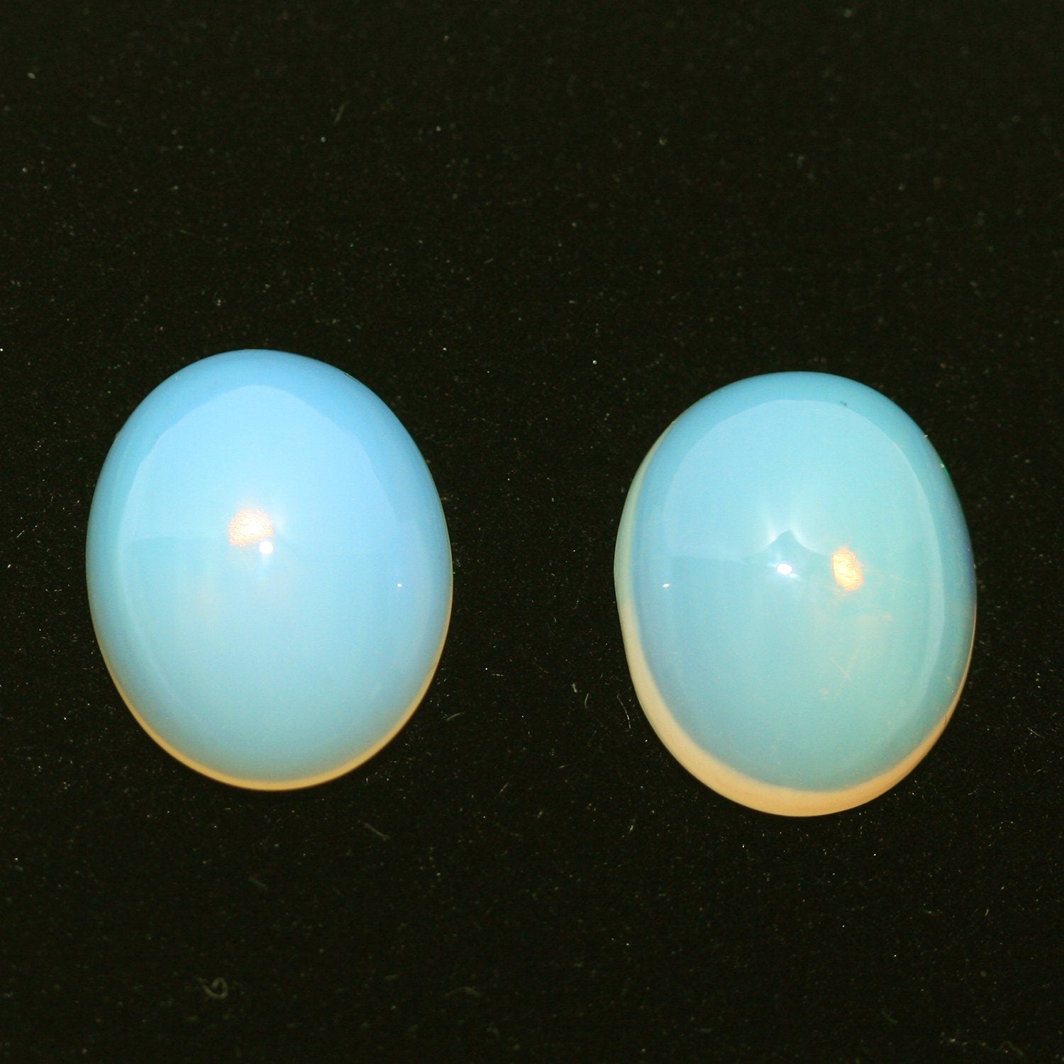 Ethiopian Opal Pair Oval Cabochon 11x9mm. (2pcs)