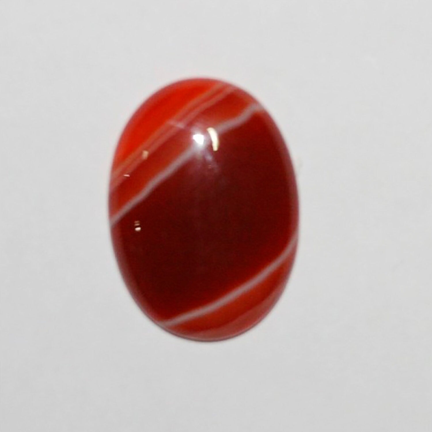 Lote de 2 cabujones ovalados de cornalina rayada de 30 x 22 mm (2 unidades)