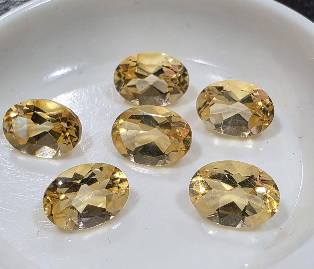 Lot de 6 citrines ovales à facettes de 7 x 5 mm. Pierres précieuses en vrac, prix de gros.
