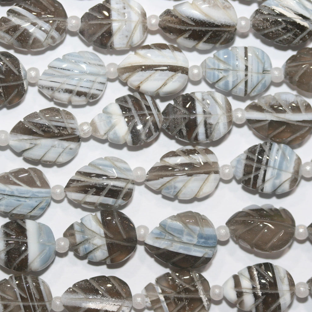 Cuentas de hoja galonadas de ópalo azul de 8" (12 x 8 mm). Aprox. - Hilo de 20 cm. - Artículo 15029