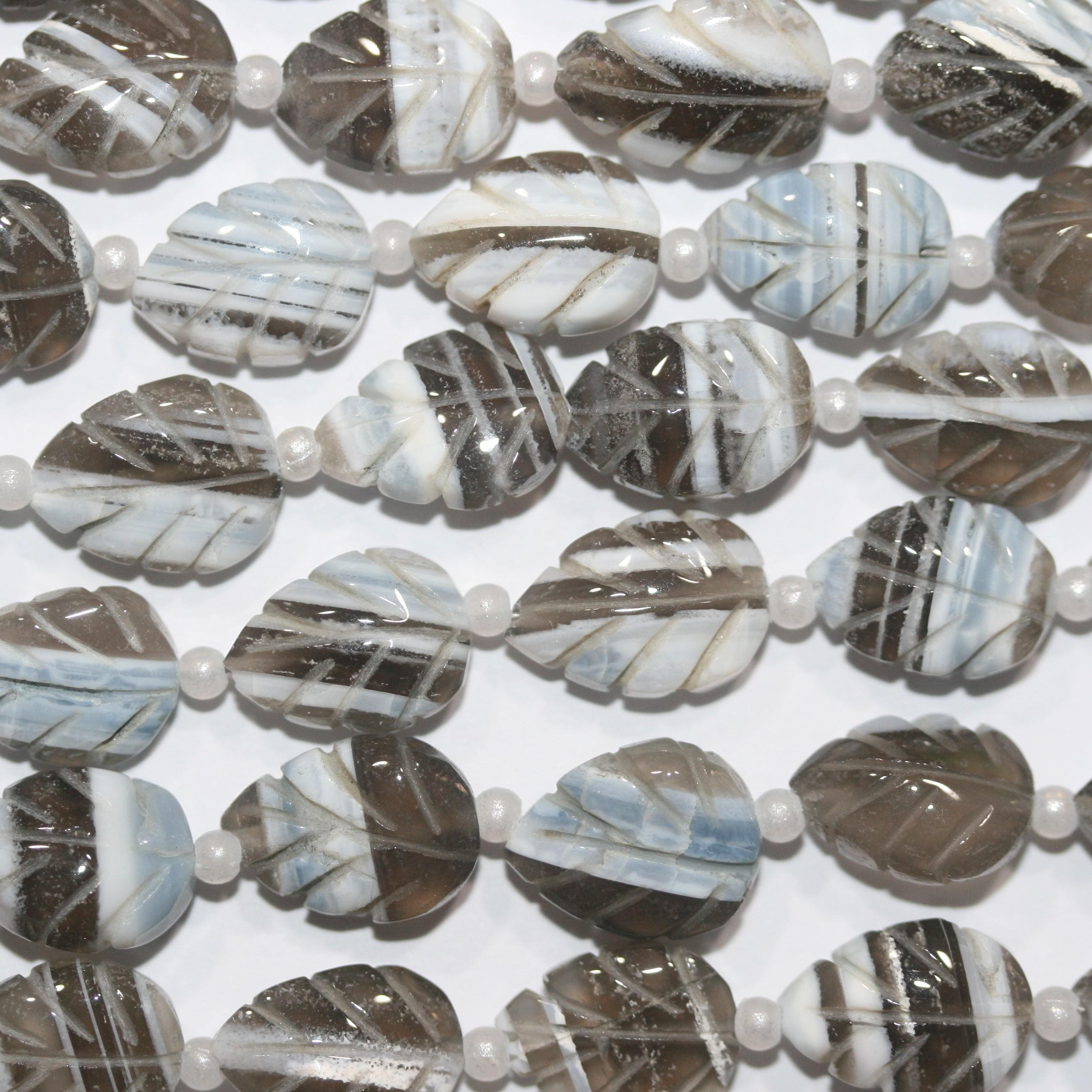 Cuentas de hoja galonadas de ópalo azul de 8" (12 x 8 mm). Aprox. - Hilo de 20 cm. - Artículo 15029