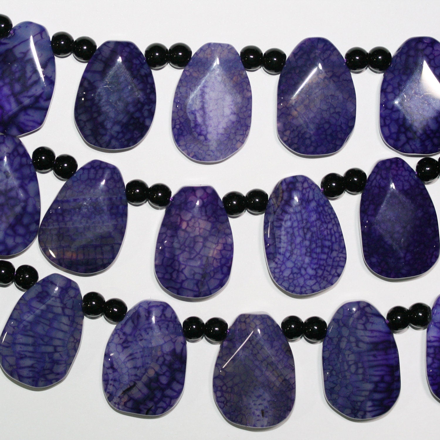 Cuentas facetadas de ágata morada de 16" de St. 30 x 20 mm - Hilo de 40 cm.