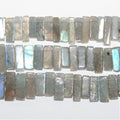 Perles rectangulaires lisses en labradorite de 8 pouces (12 x 5 mm). Longueur du fil : environ 21 cm.