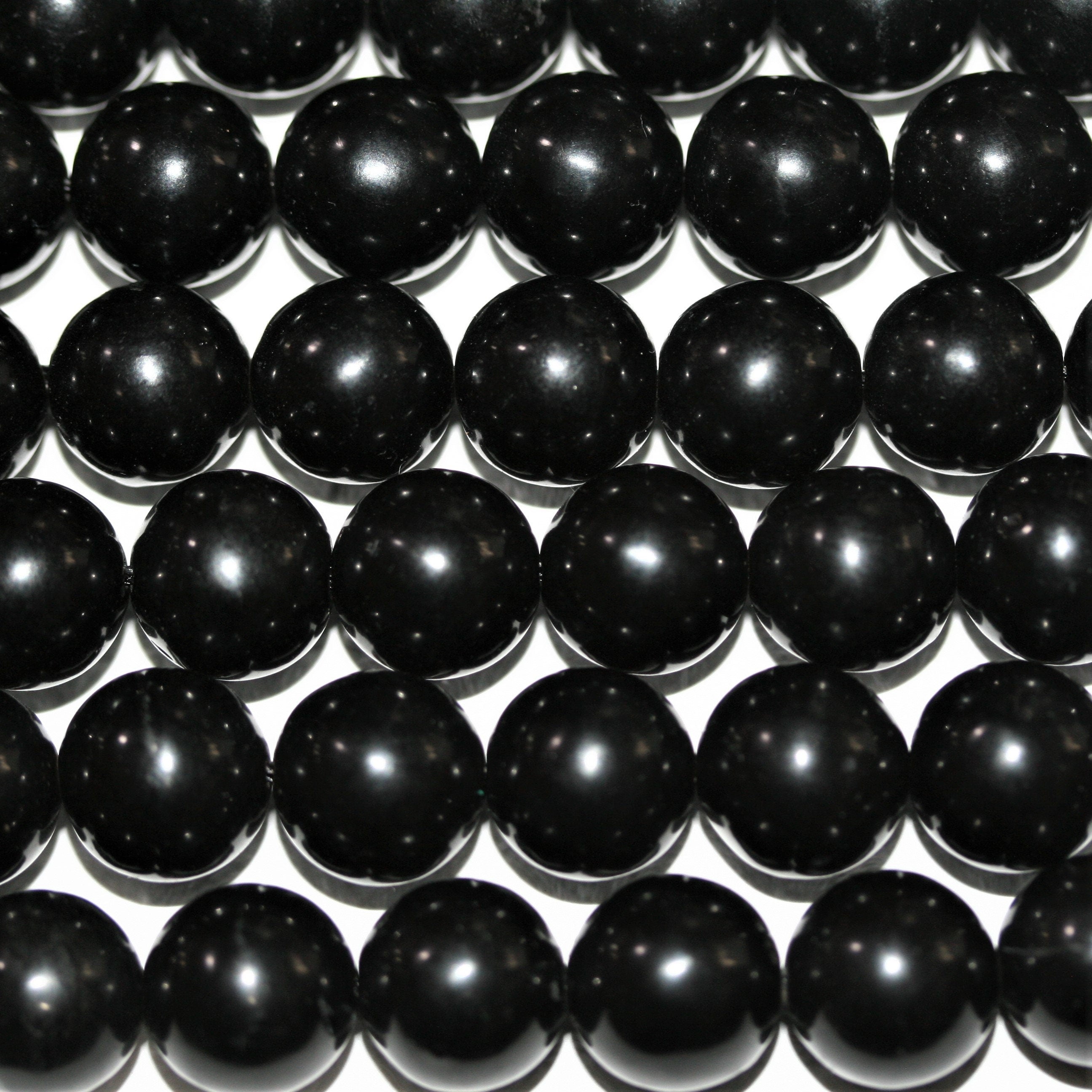 Perles rondes lisses Jet 12 mm - Fil de 40 cm.