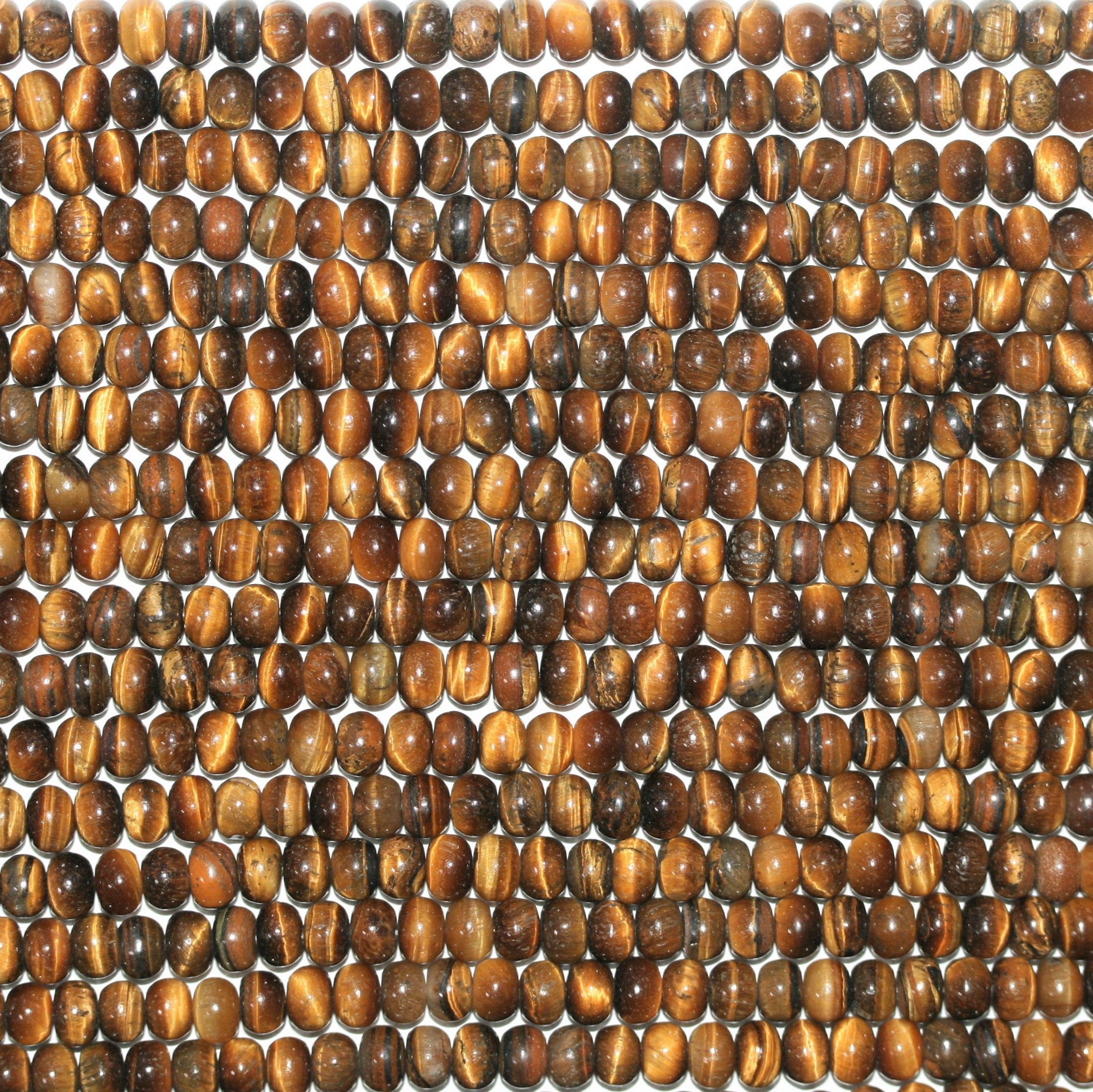 Perles rondelles lisses œil de tigre St 15" 6x4mm.- Brin 39cm.