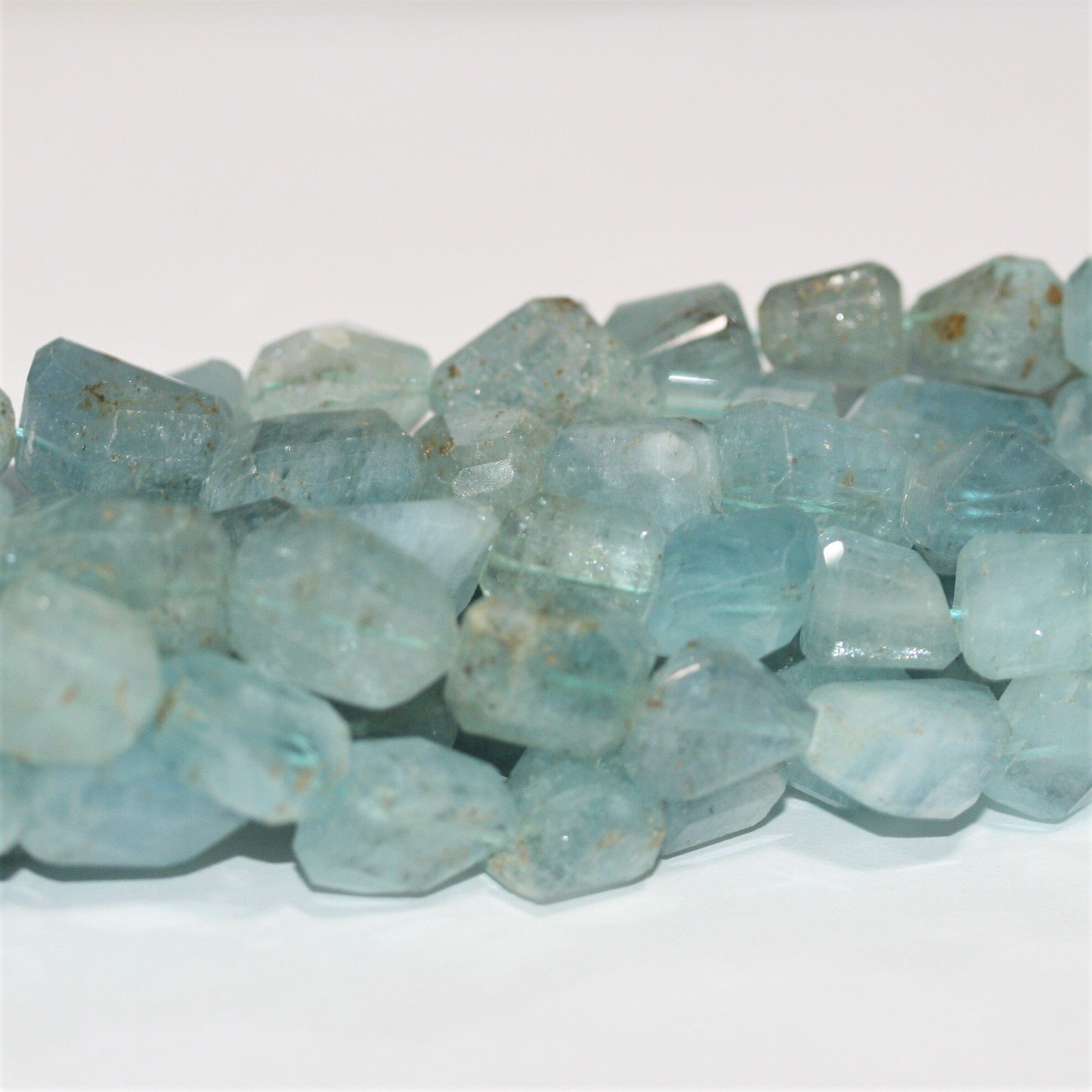 14" St Aquamarine Irregular Faceted Nugget -Strand 37cm.