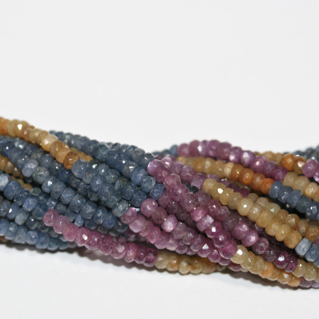 Cuentas redondas facetadas graduadas de rubí y zafiro de 20" de St., de 3 x 2 a 5 x 3 mm. Longitud aproximada: tira de 52 cm.