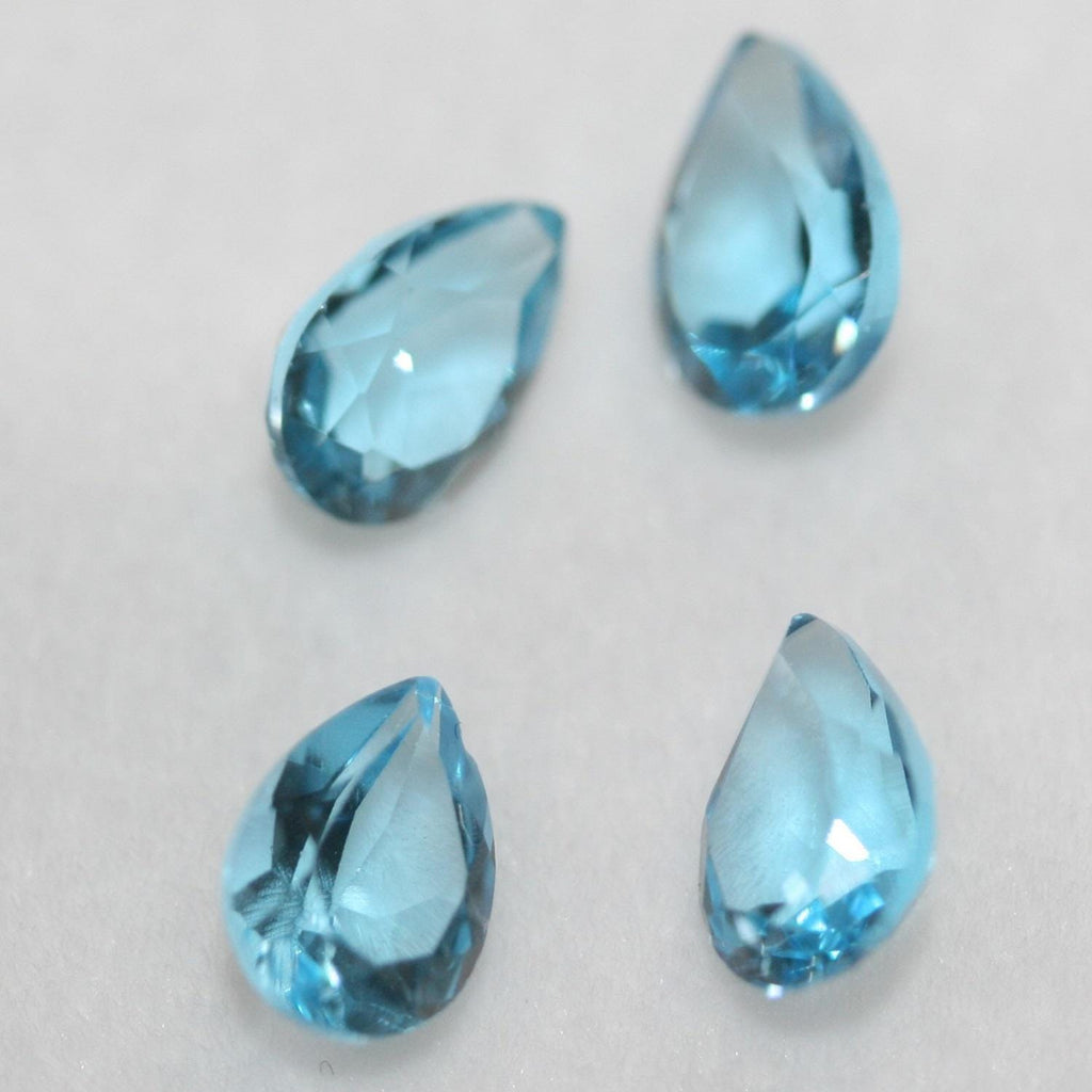 Lote de 4 piezas de topacio azul suizo facetado, 7 x 5 mm. (4 piezas)