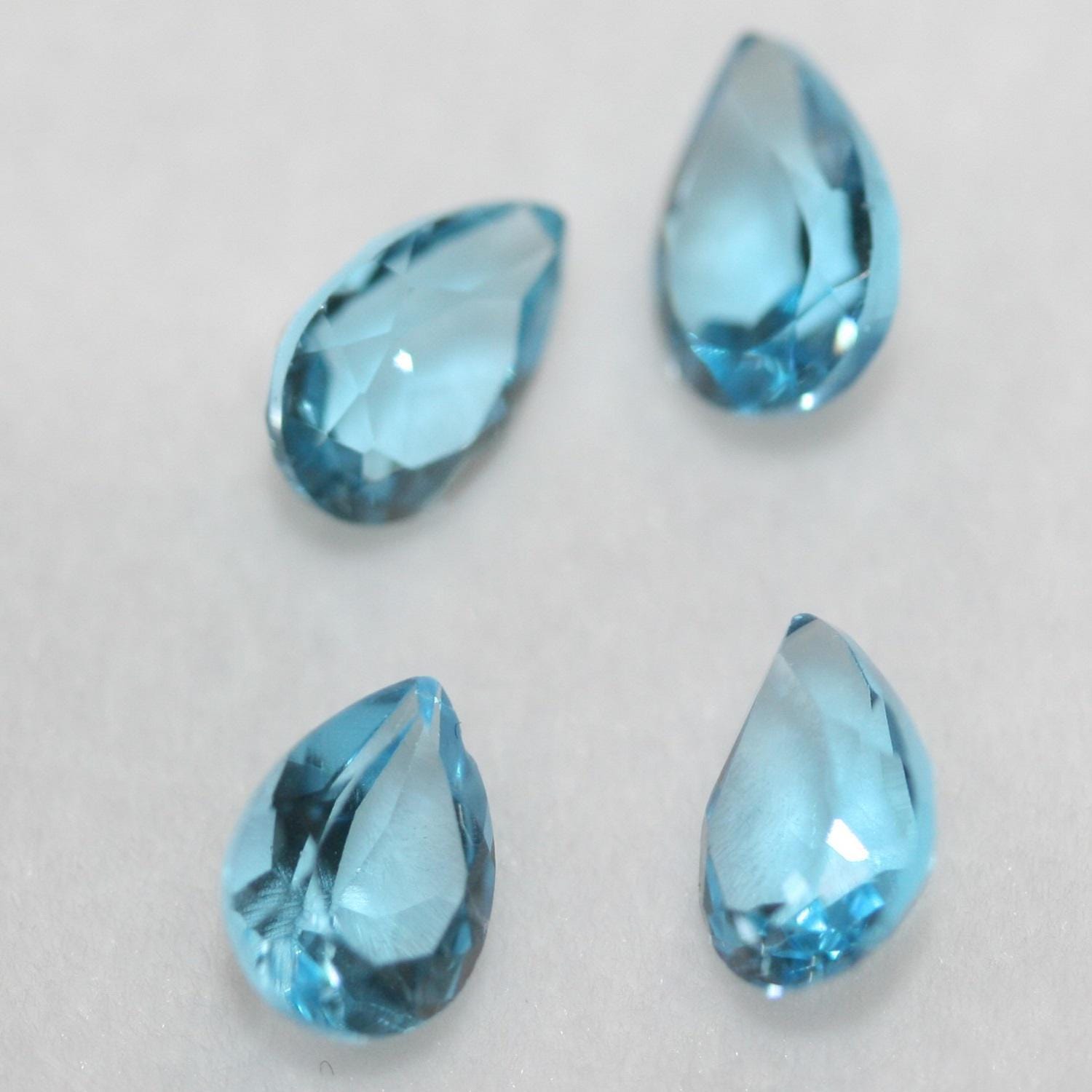 Lote de 4 piezas de topacio azul suizo facetado, 7 x 5 mm. (4 piezas)