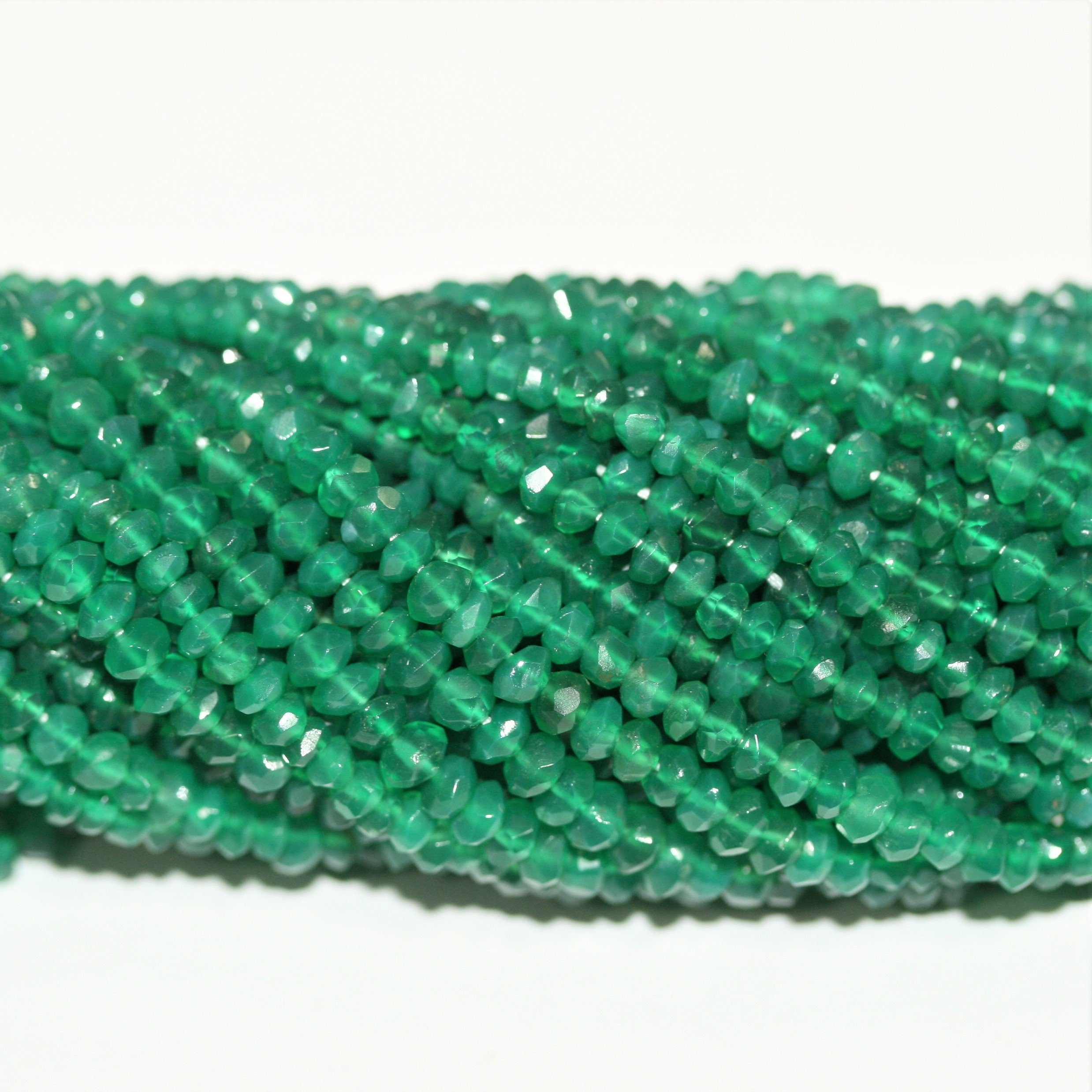Perles rondelles à facettes en onyx vert 4x3mm.-Rig 37cm.