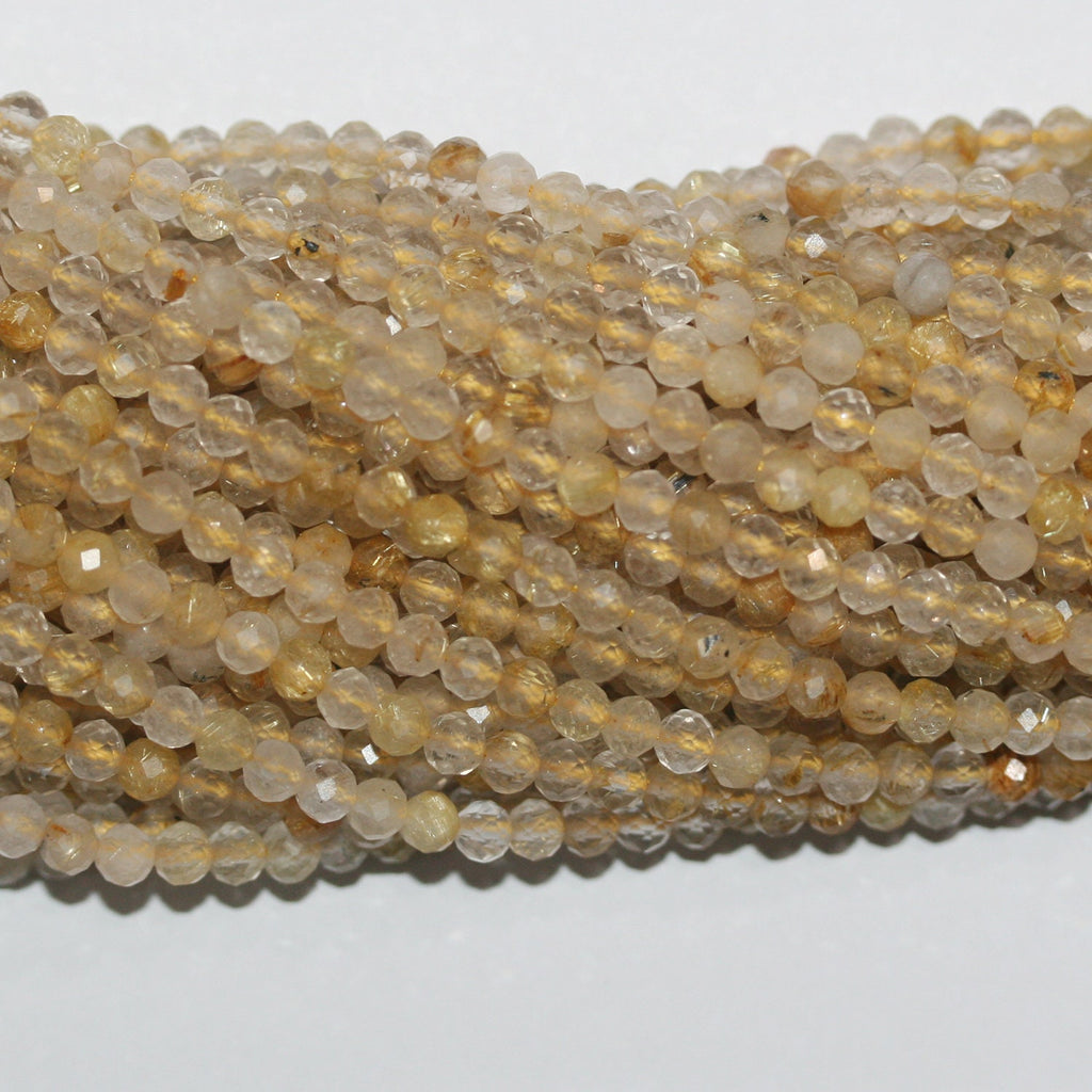 Perles rondes à facettes en quartz rutile St 15" 4 mm - Fil 39 cm.