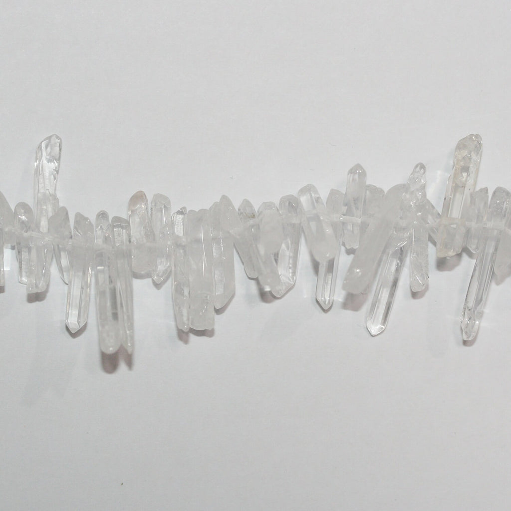 Perlas de cristal de roca de cuarzo sin pulir de 16", 25-18 x 5 mm, aprox., hilo de 40 cm.