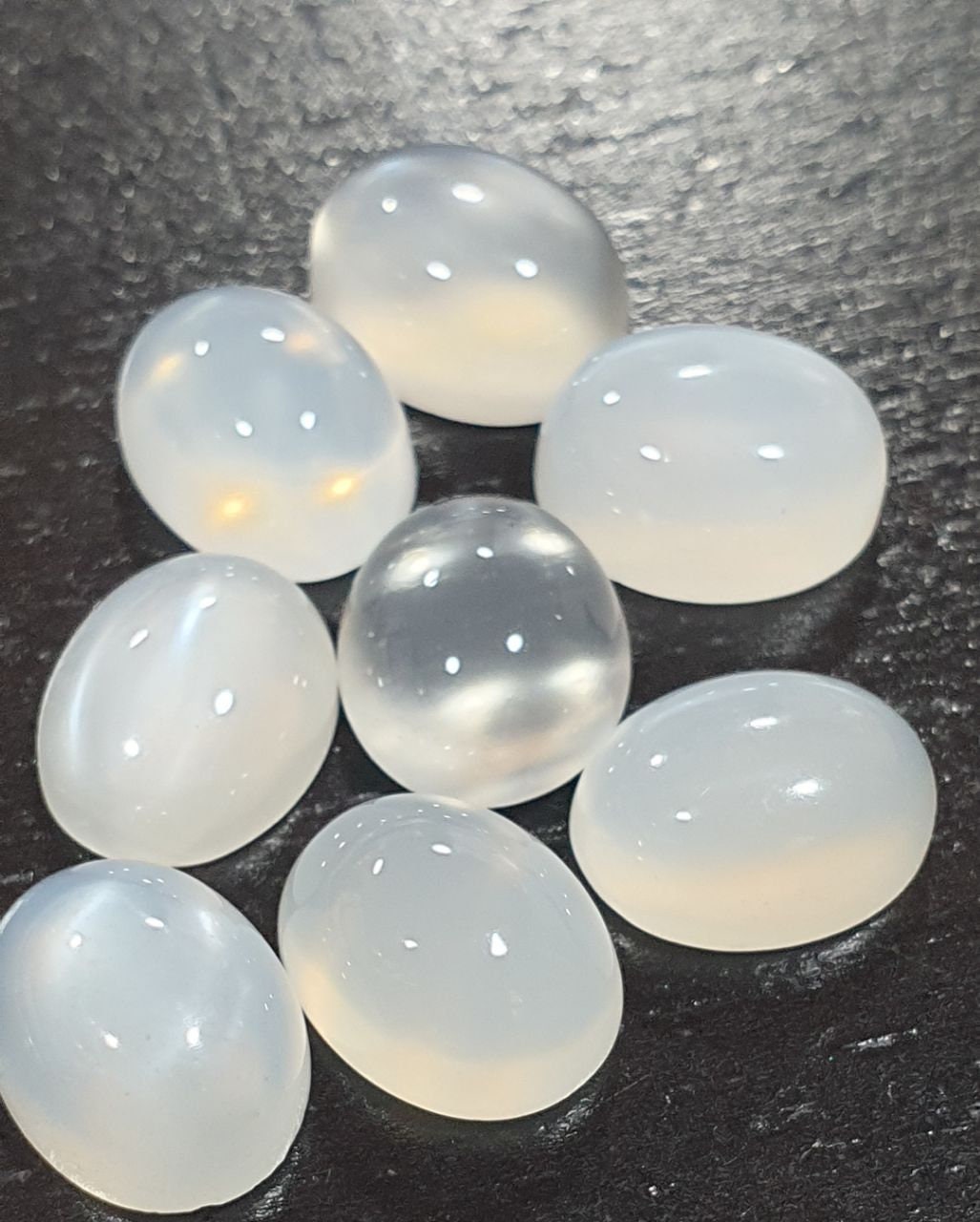 Lote de 8 cabujones ovalados de piedra lunar de ojo de gato blanco de 10 x 8 mm. (8 piezas)