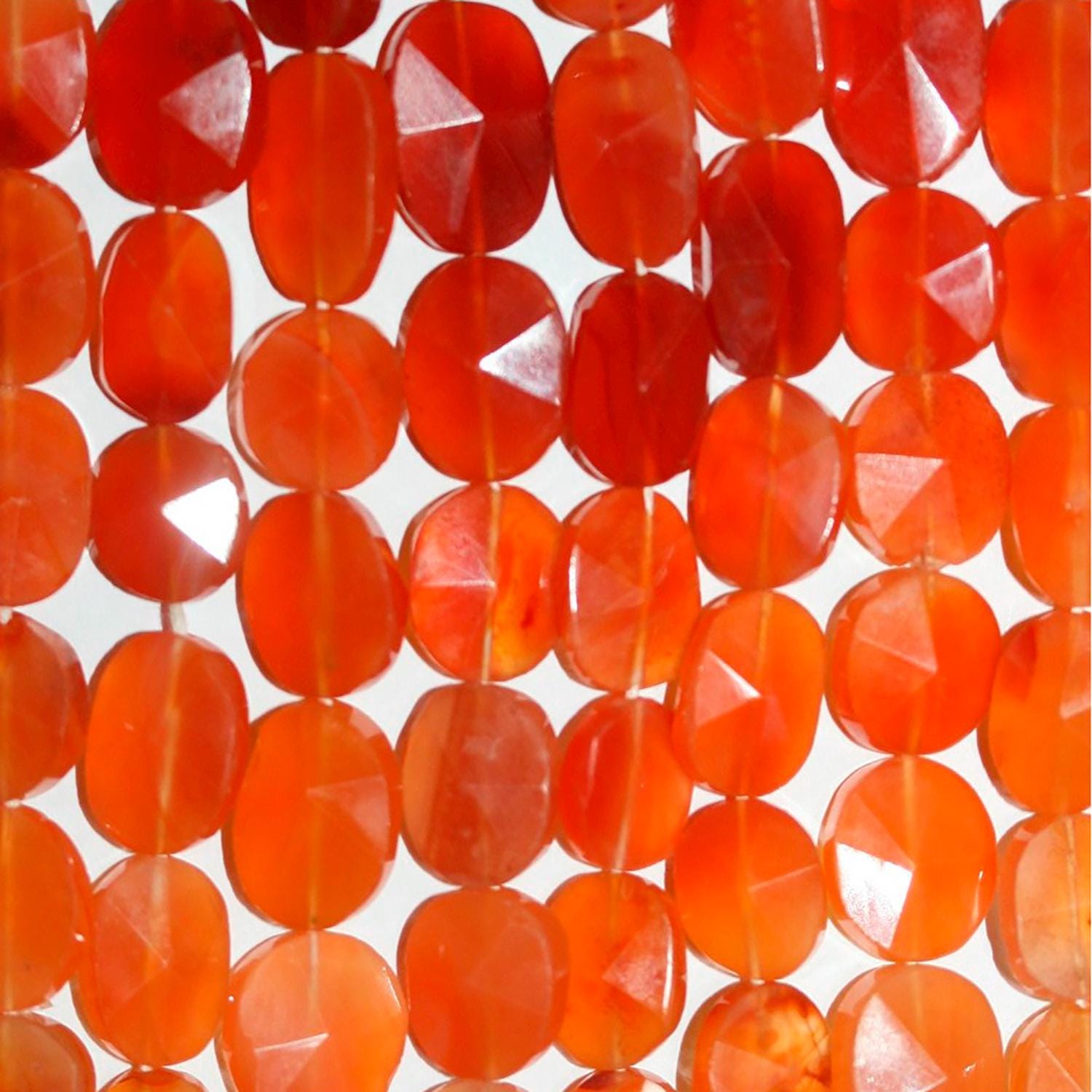 14" St Carnelian Faceted Oval Beads 12x8mm.-Approx.-Strand 37cm