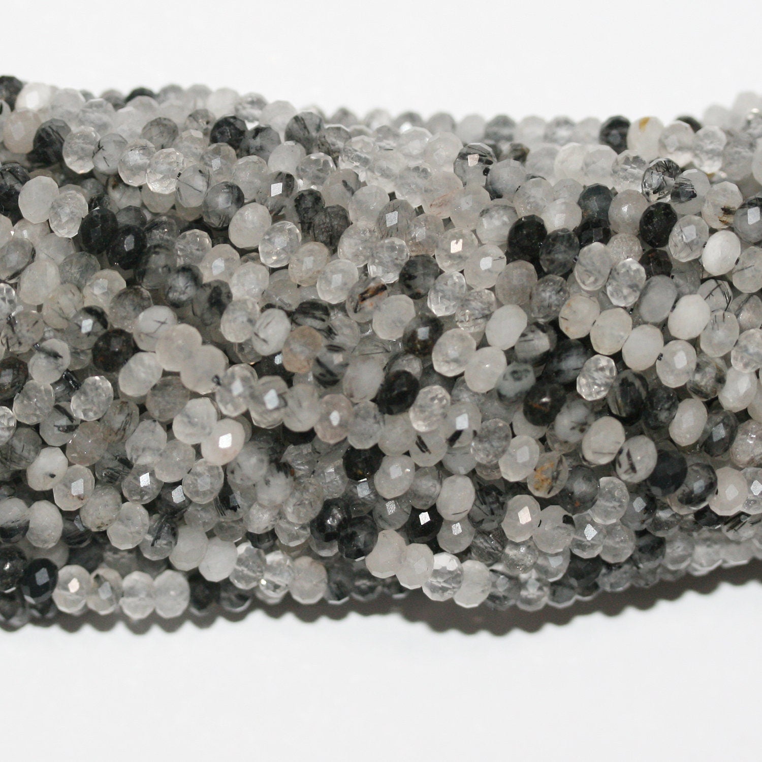 Perles rondelles à facettes en quartz tourmaliné St 15" 5x3mm.-Rig 39cm.
