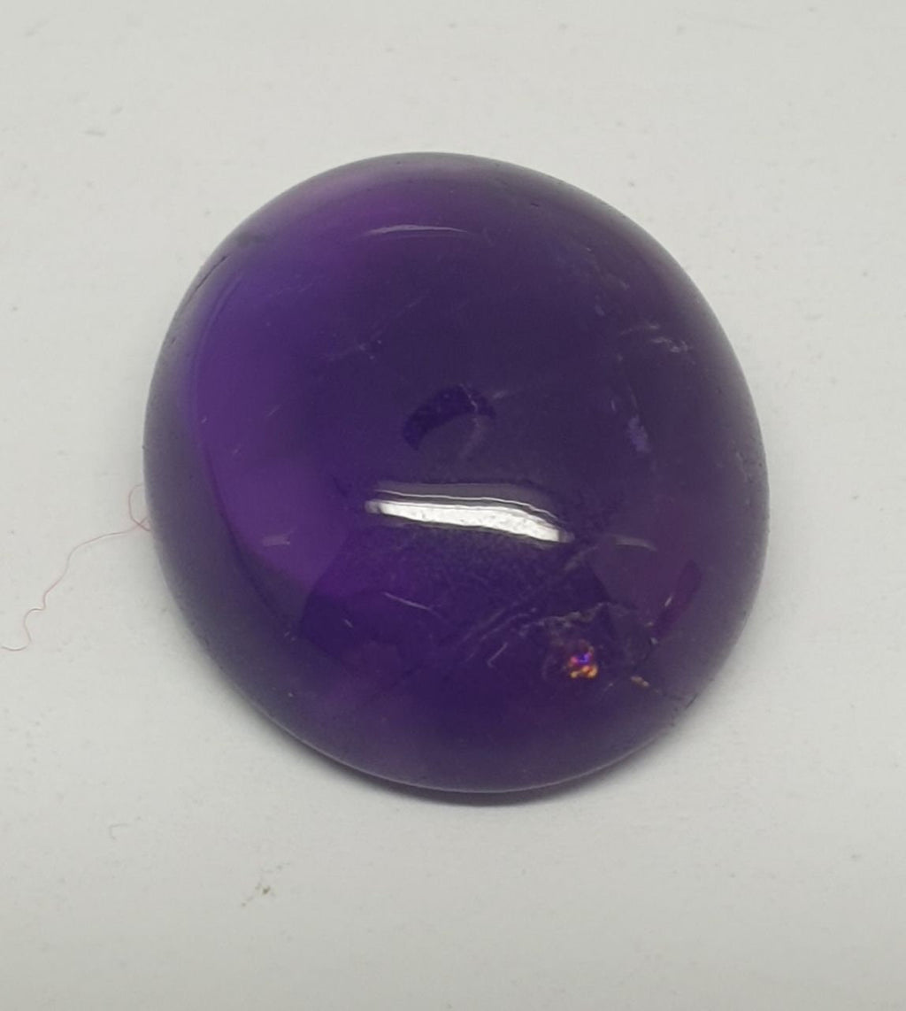 Cabochon ovale d'améthyste africaine 20x16,5mm.-(20,85ct).