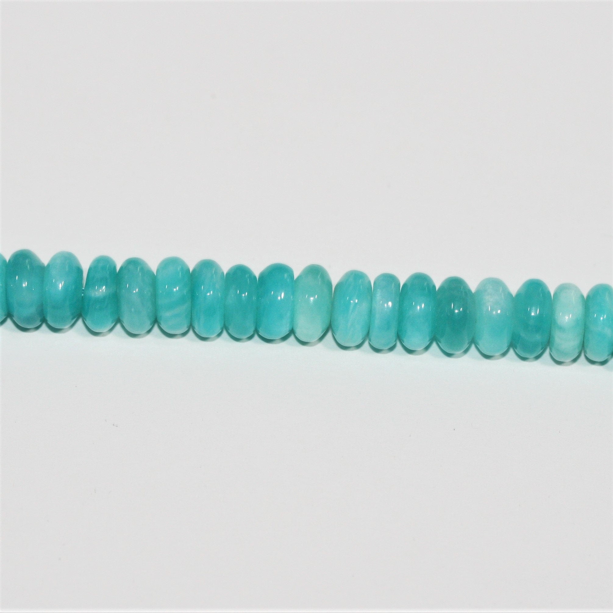 Cuentas redondas lisas de amazonita de 16", 9 x 4 mm. Aprox. - Hilo de 40 cm.