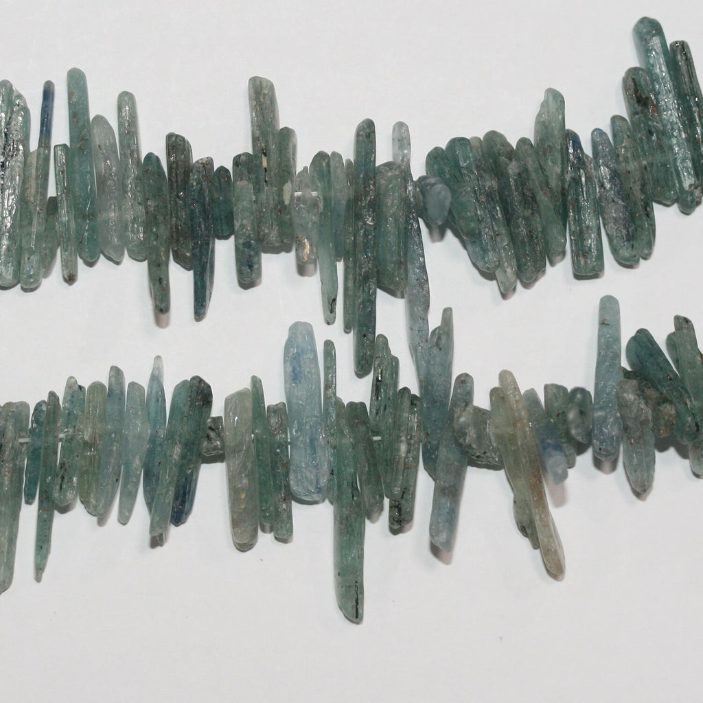 Perlas de cianita santa de 16", acabado mate, sin pulir, de 25 a 18 x 5 mm, aprox., hilo de 40 cm.