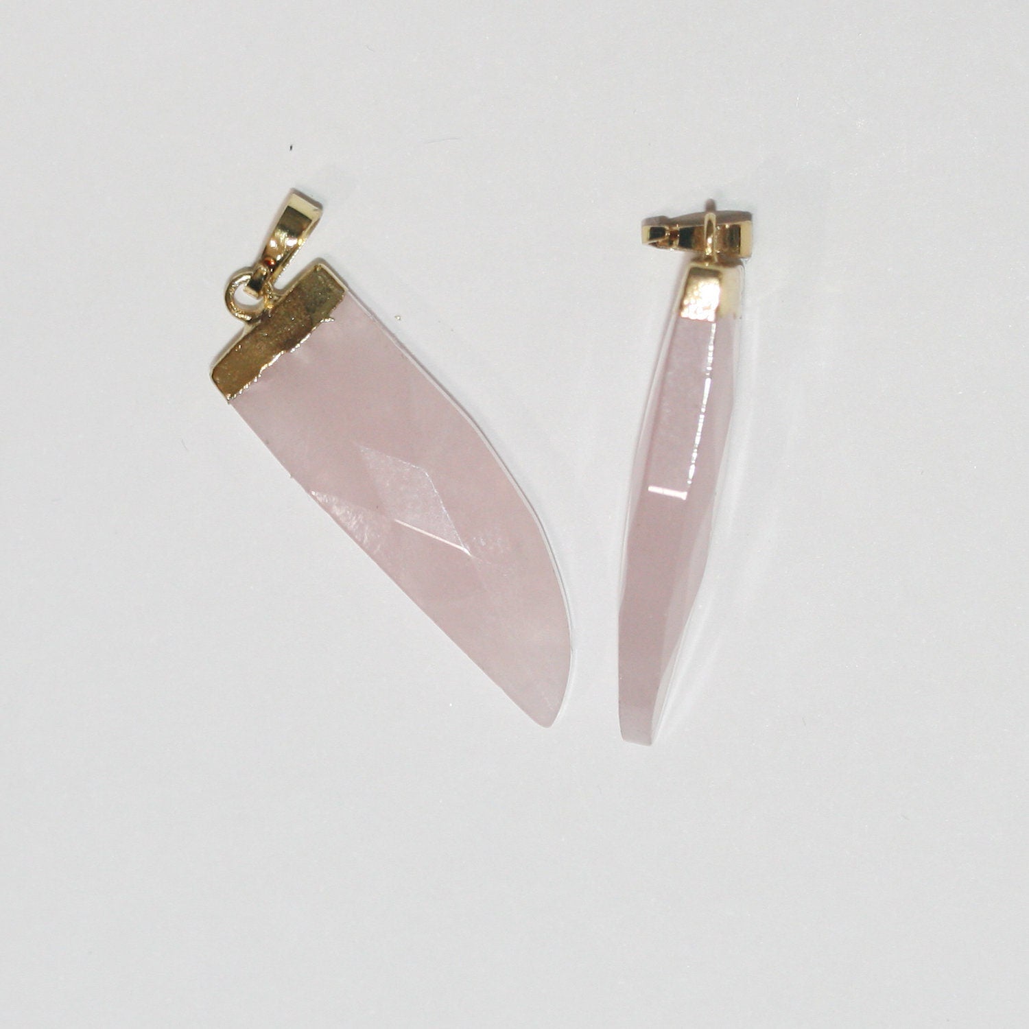 Pendentif bâtonnet à facettes en quartz rose 30x10mm.( 1 pièce )