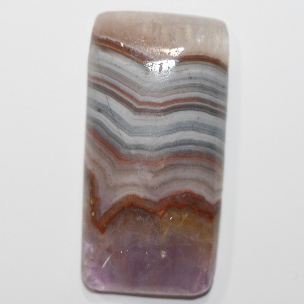 Cabochon rectangulaire lisse d'améthyste 40x20mm.