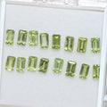 Lote de 16 piezas de peridoto facetado baguette de 5 x 3 mm. (16 piezas)