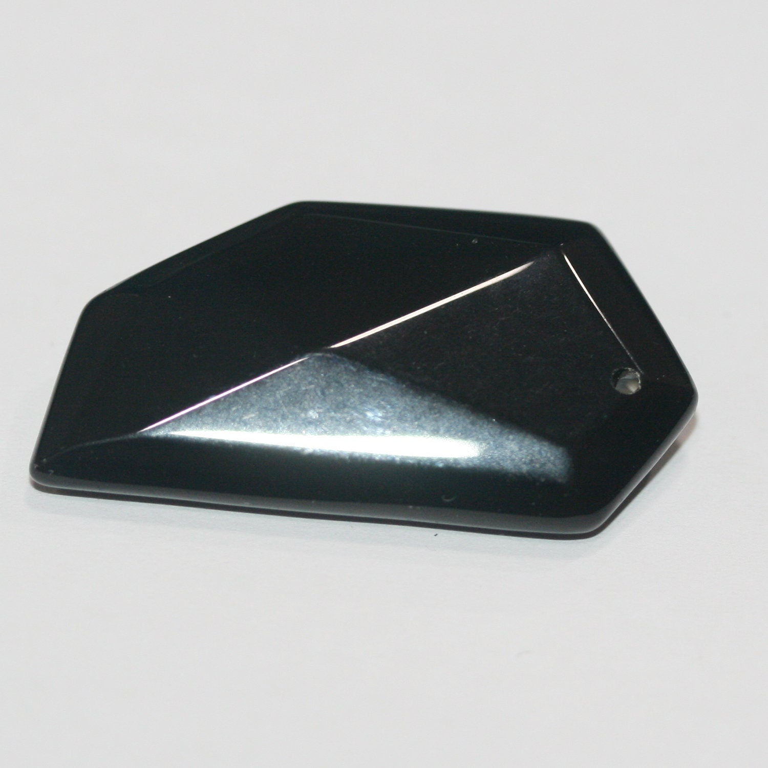 Colgante de ónix facetado de 40 x 20 mm