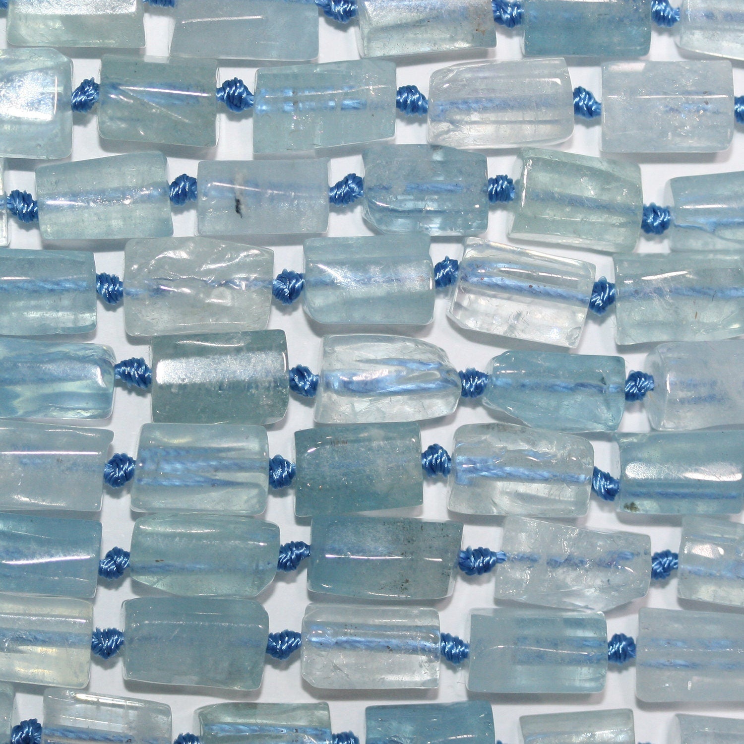 Cuentas tubulares facetadas de aguamarina Santa de 17", 11 x 7 mm (aprox. - Hilo de 42 cm)