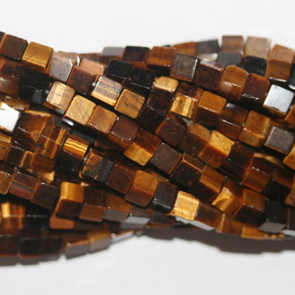 Perles cubiques lisses œil de tigre St 15" 4 mm - Fil de 39 cm