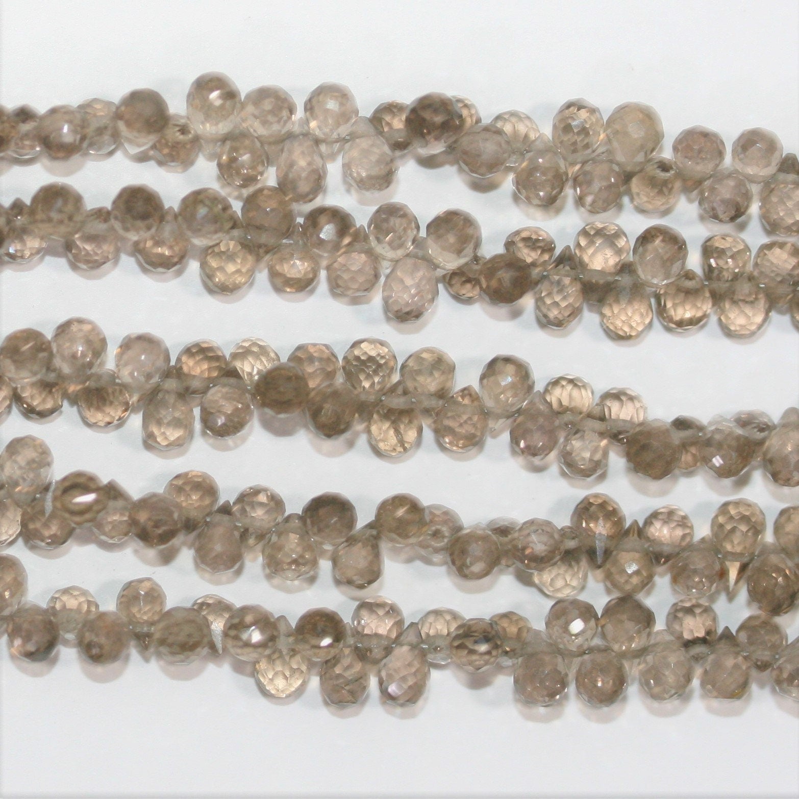 Perles en quartz fumé facettées St 8" 5x3mm.-Rig 20cm.