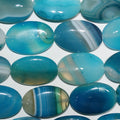 Cuentas ovaladas lisas de ágata azul rayada de 16" (30 x 20 mm) - Hilo de 40 cm