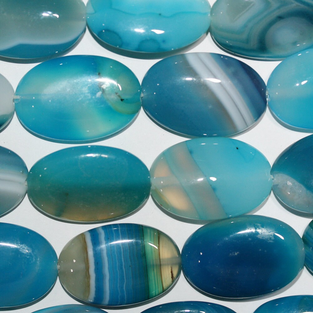 Cuentas ovaladas lisas de ágata azul rayada de 16" (30 x 20 mm) - Hilo de 40 cm