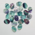 Lote de 4 cabujones ovalados de fluorita de 16 x 12 mm. (4 uds.)
