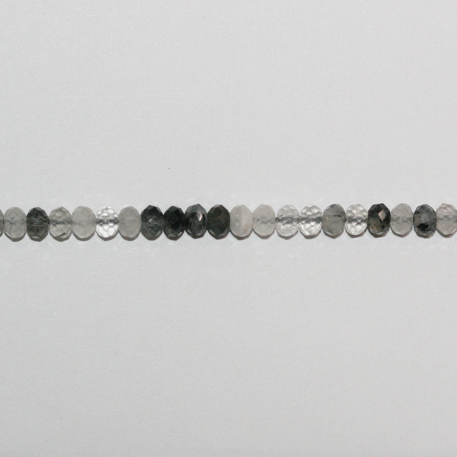 Perles rondelles à facettes en quartz tourmaliné St 15" 5x3mm.-Rig 39cm.