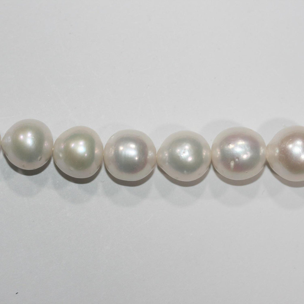 Perles rondes d'eau douce dégradées de 10 à 13 mm, 40 cm de diamètre. Collier de 40 cm. Perles naturelles à prix de gros.