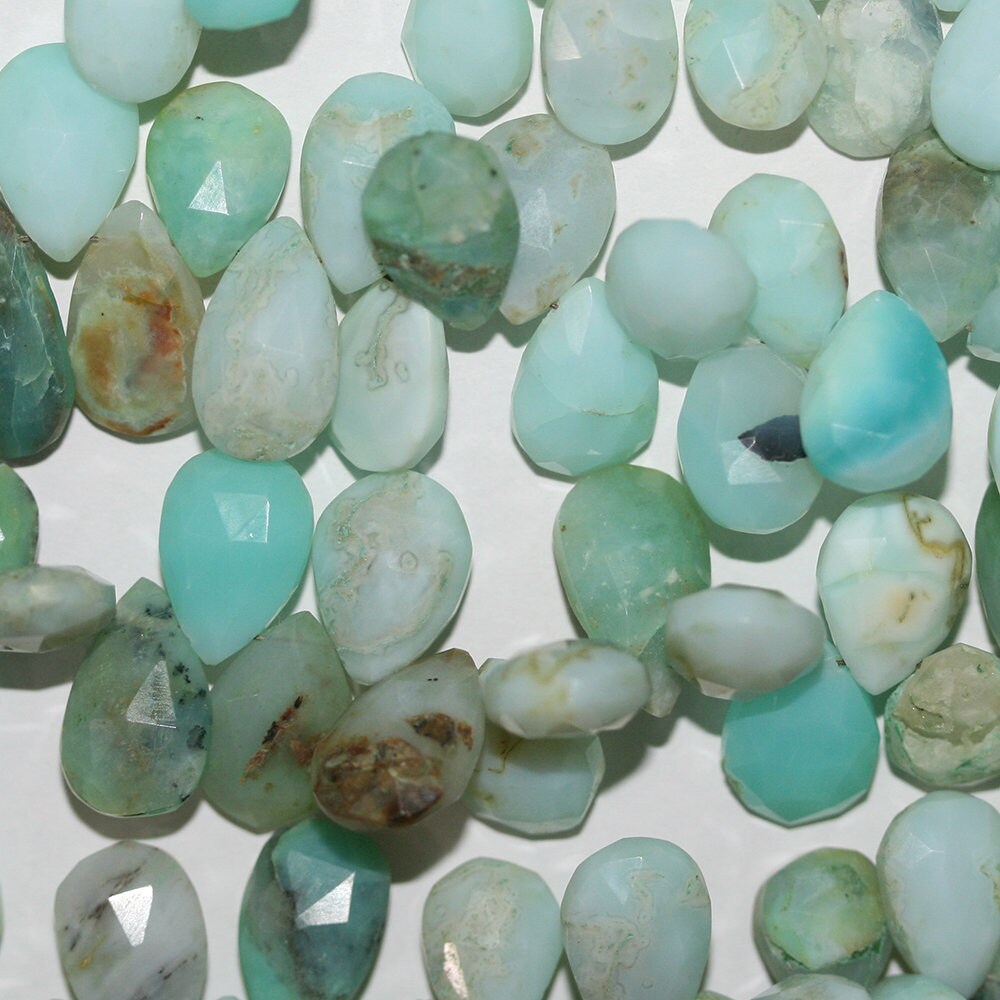 Cuentas de ópalo peruano facetadas de 18 cm (7"), 13 x 8 mm (aprox.). Hilo de 18 cm.