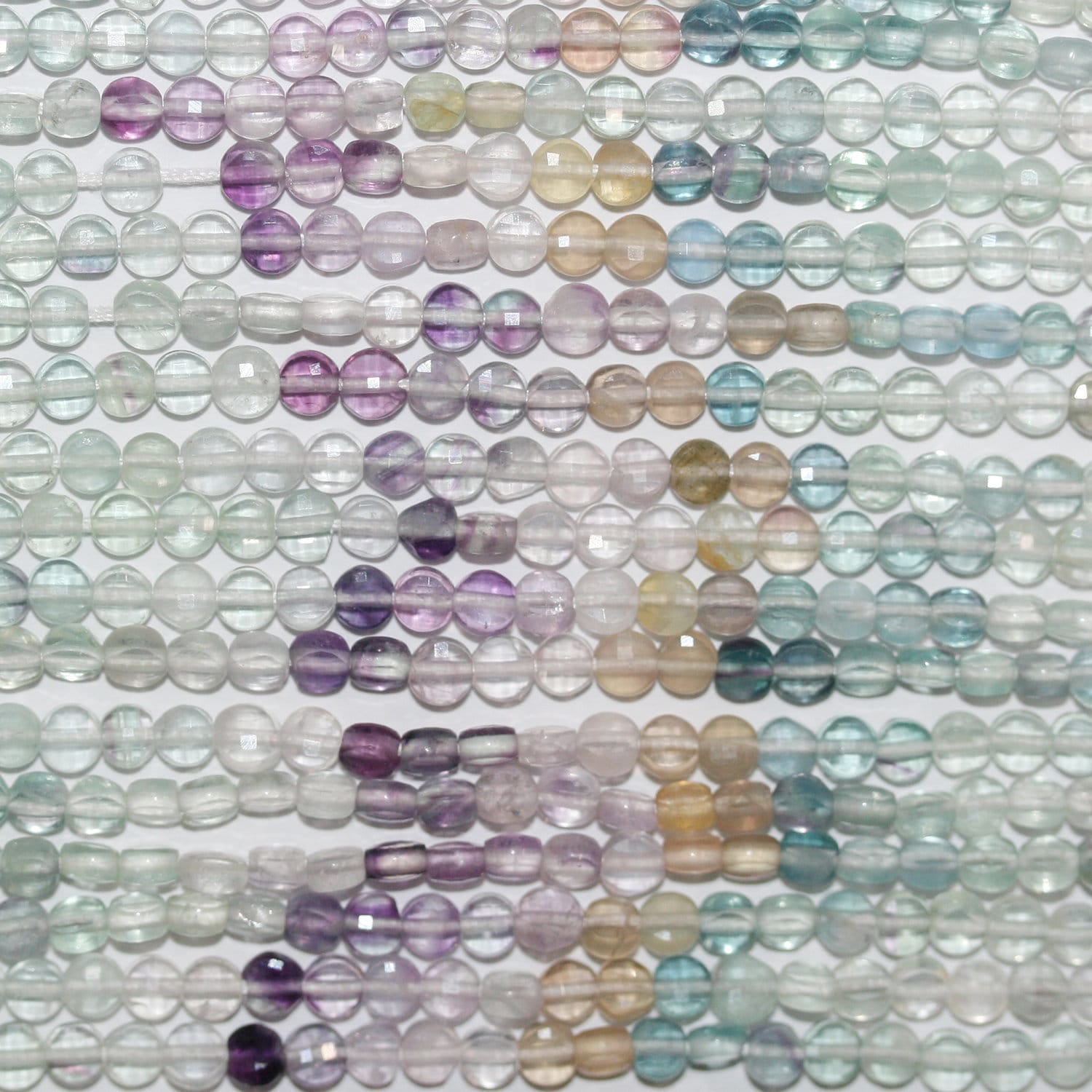 12" St Fluorite Faceted Coin Beads 4mm.-Strand 32cm.