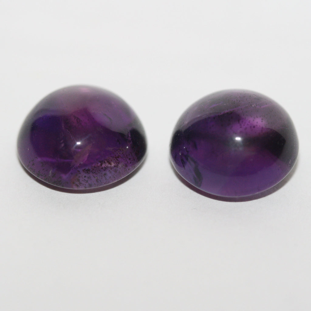 Paire d'améthystes cabochons ronds de 13 mm.