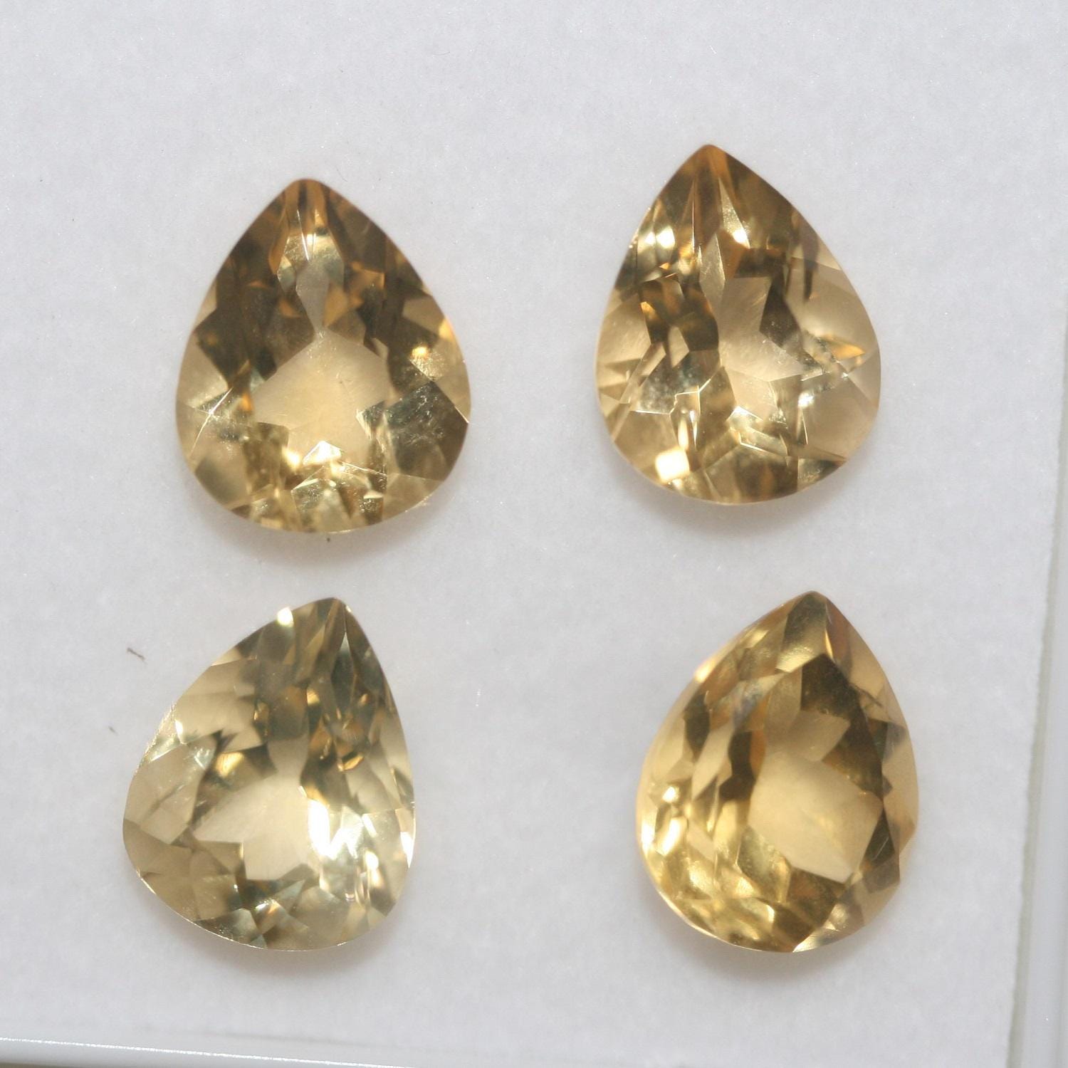 Lote de 4 piezas de citrino facetado gota 11x9 mm. (4 piezas).