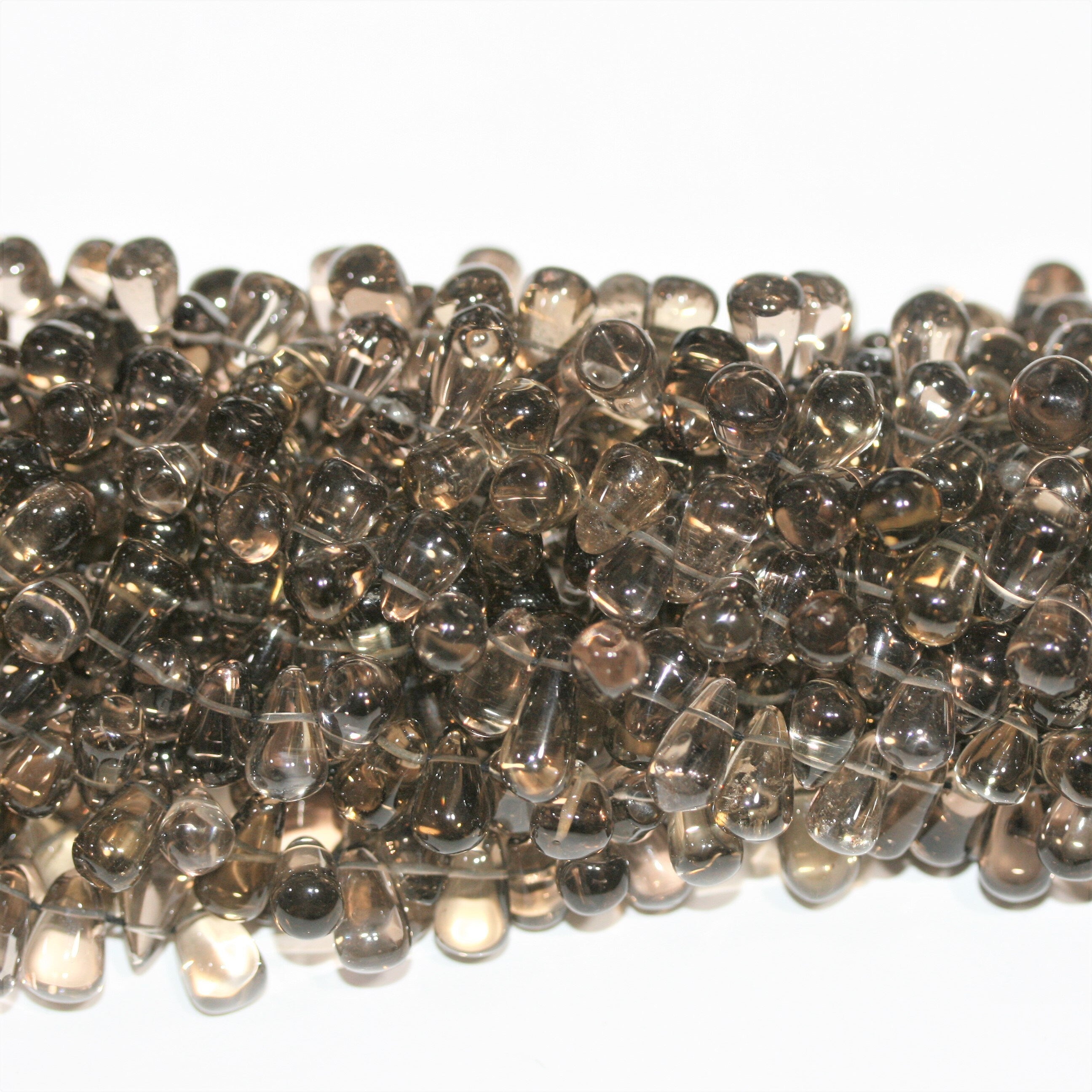 Perles en quartz fumé lisses en forme de goutte 12x7mm.- Fil 37cm.