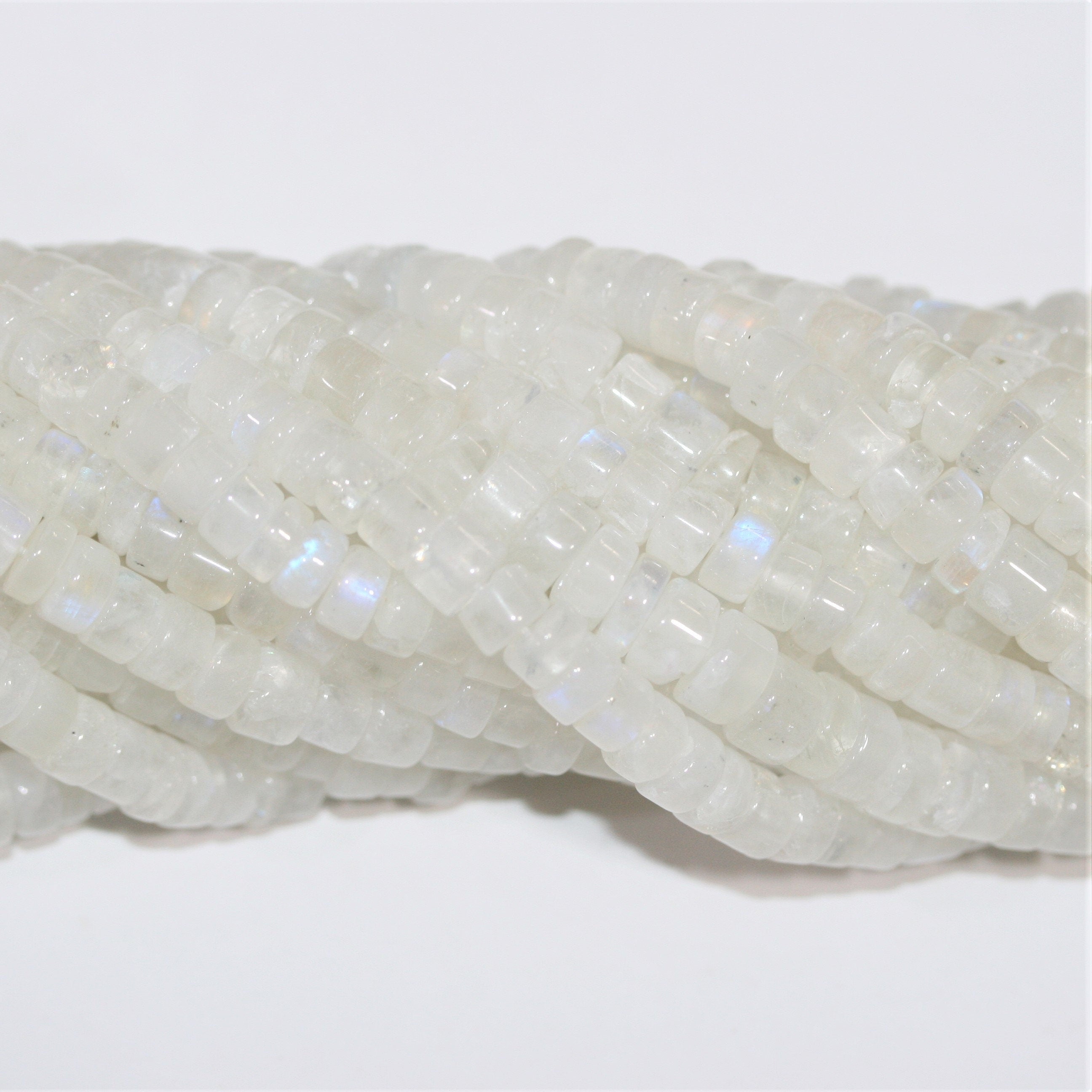 13" St Moonstone Smooth Disc Beads 6x4mm. Approx.- Strand 33cm.