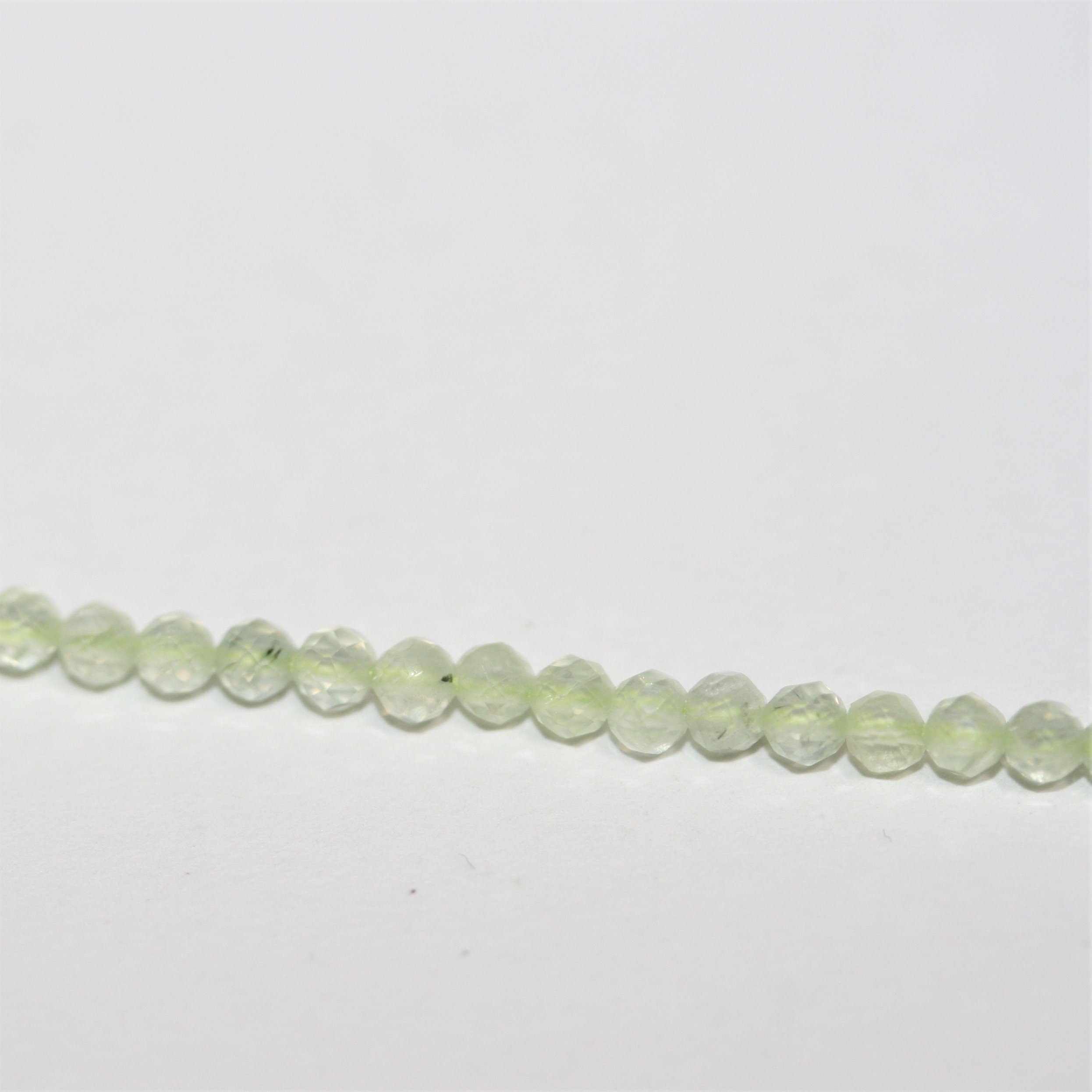 13" St Prehnite Faceted Round Beads 2.5mm.- Strand 34cm.