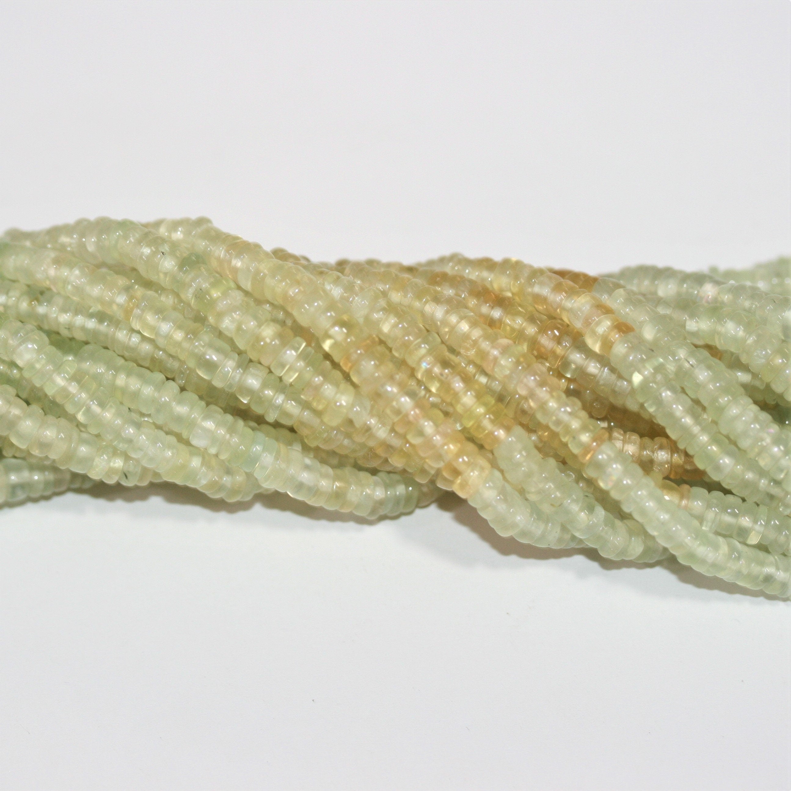 Cuentas de disco lisas de prehnita St. de 16" de 5 x 2 mm - Hilo de 42 cm.