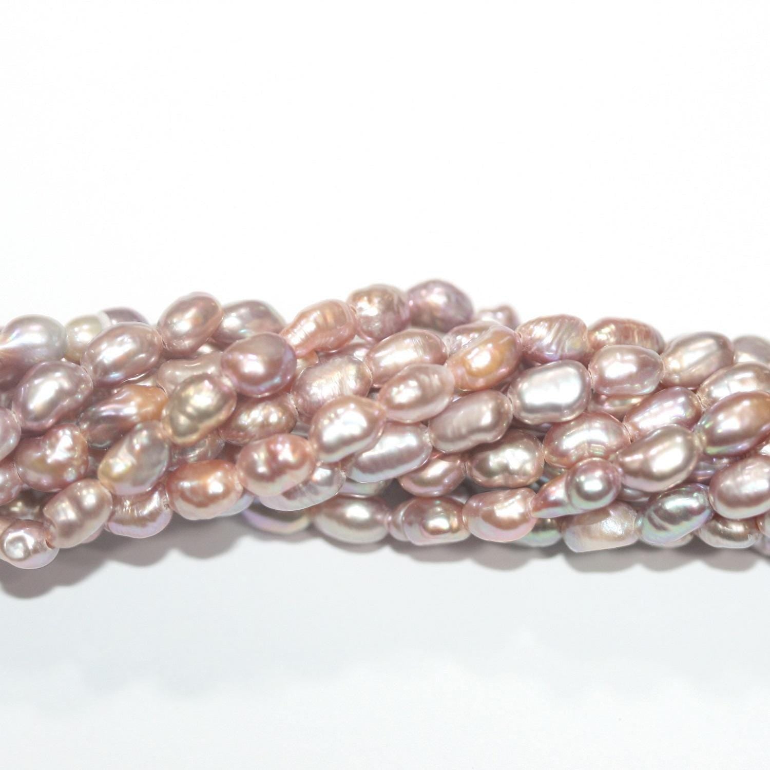 11" St FreshWater Salmon Oval Pearl Irregular Beads 6-7mm Approx.- Strand: 35cm.